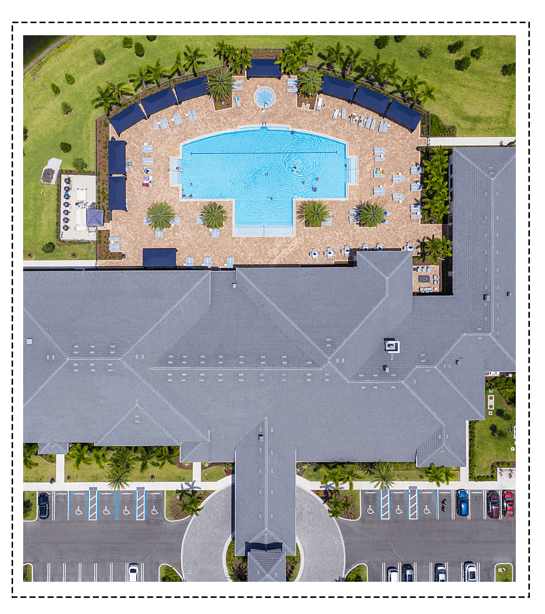 aerial view of a pool and clubhouse