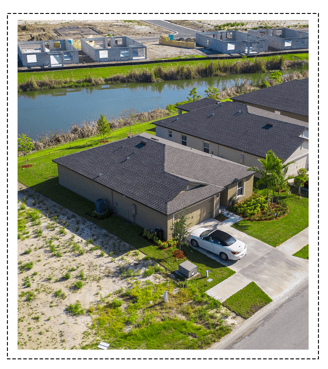 aerial view of a housing development in Florida with some houses under construction